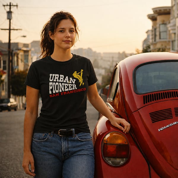 girl standing next to volkswagen wearing urban pioneers t shirt